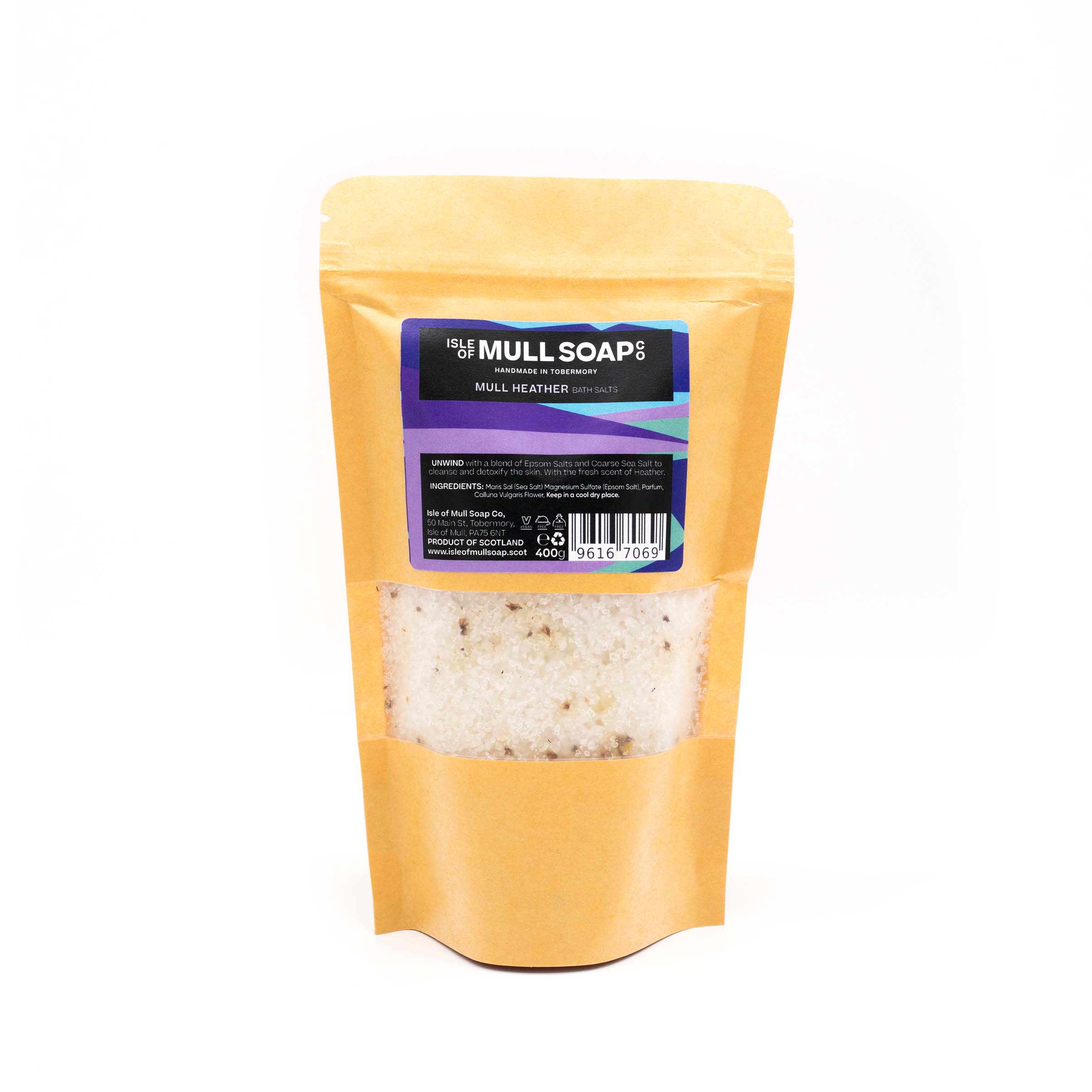 Kraft display bag with window containing mull heather bath salts. white with heather flowers through them. handmade in Tobermory by the Isle of Mull soap co.