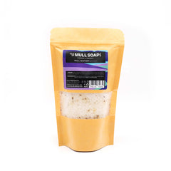 Kraft display bag with window containing mull heather bath salts. white with heather flowers through them. handmade in Tobermory by the Isle of Mull soap co.