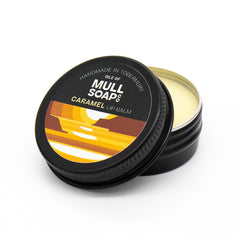 caramel lip balm in a black tin with colourful label. vegan lip balm handmade in Tobermory by the Isle of Mull soap co.