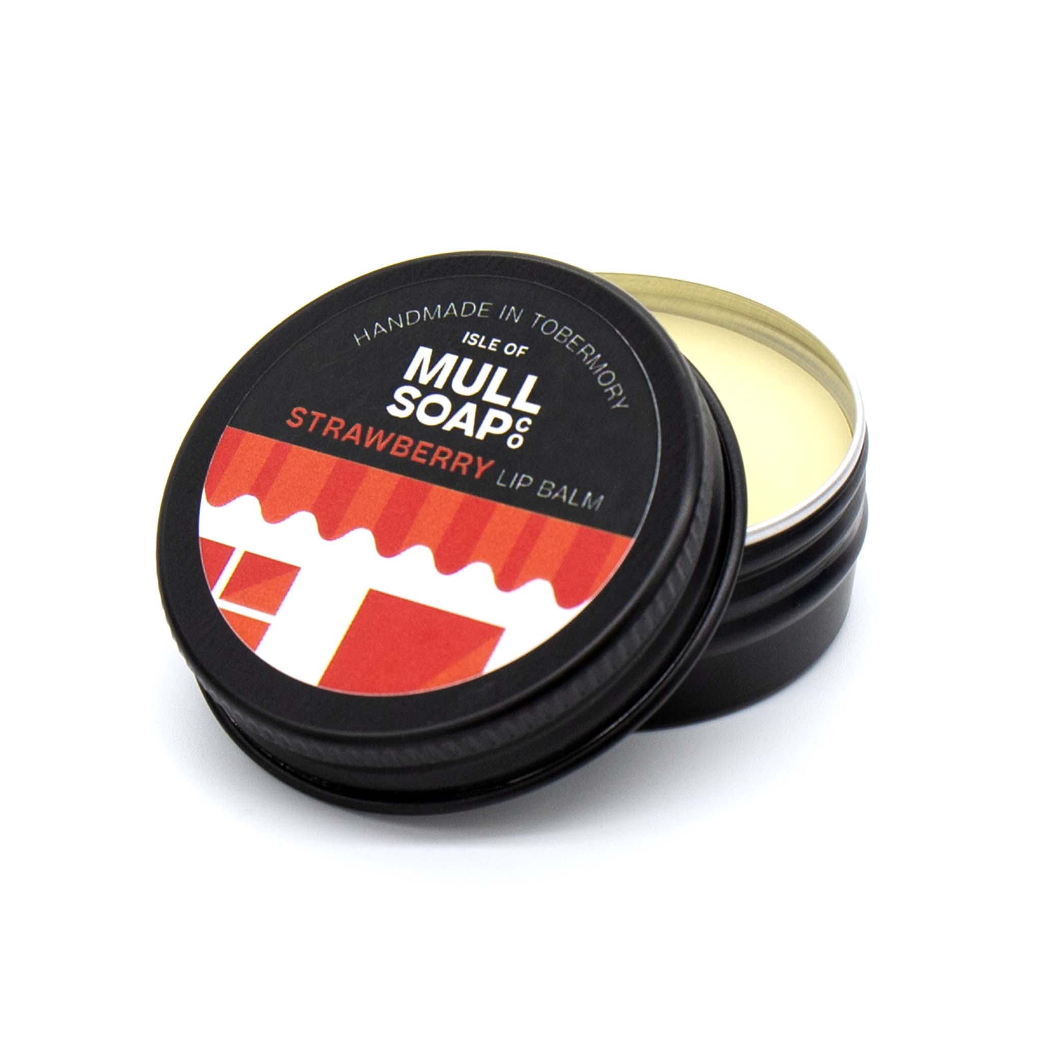 strawberry lip balm in a black tin with colourful label. vegan lip balm handmade in Tobermory by the Isle of Mull soap co.