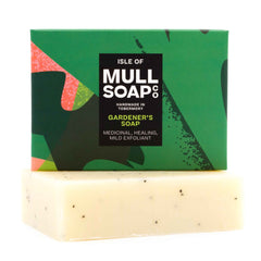 a gardeners soap box sitting on top of the soap bar. The box is dark green and bold leaf design. The soap is medicinal, healing and a mild exfoliant. Handmade in Tobermory by the Isle of Mull soap co.