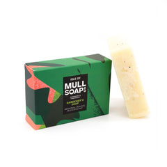 a gardeners soap box sitting next to the soap bar. The box is dark green and bold leaf design. The soap is medicinal, healing and a mild exfoliant. Handmade in Tobermory by the Isle of Mull soap co.