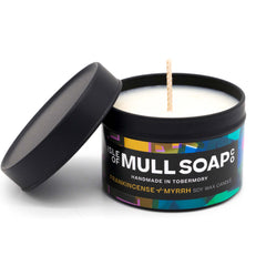 A black tin and lid with colourful funky label. Frankincense and myrrh soy candle handmade in Tobermory by the Isle of Mull Soap Co